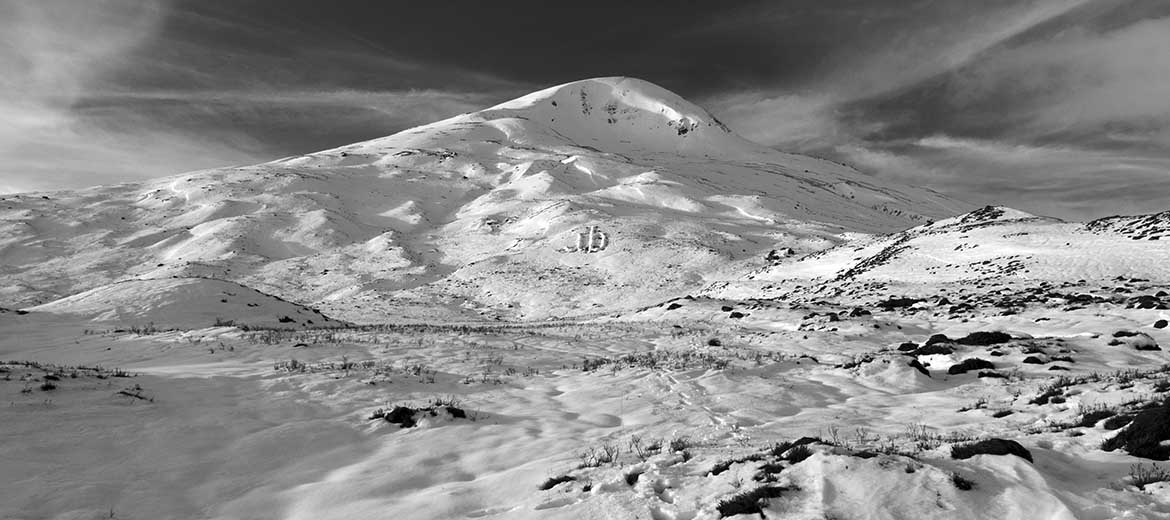 Melt by Michael Cross, the letters abc made of snow piled up on a hillside in Scotland